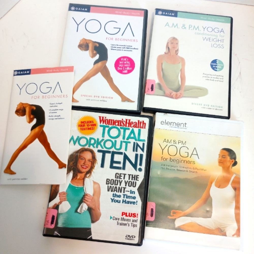 Four yoga exercise DVD videos, bundled lot